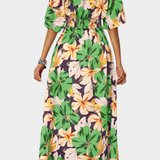 Elena | Vestido ancho con estampado floral y escote cruzado