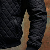 Ramiro - Chaqueta acolchada negra con hombros de cuero